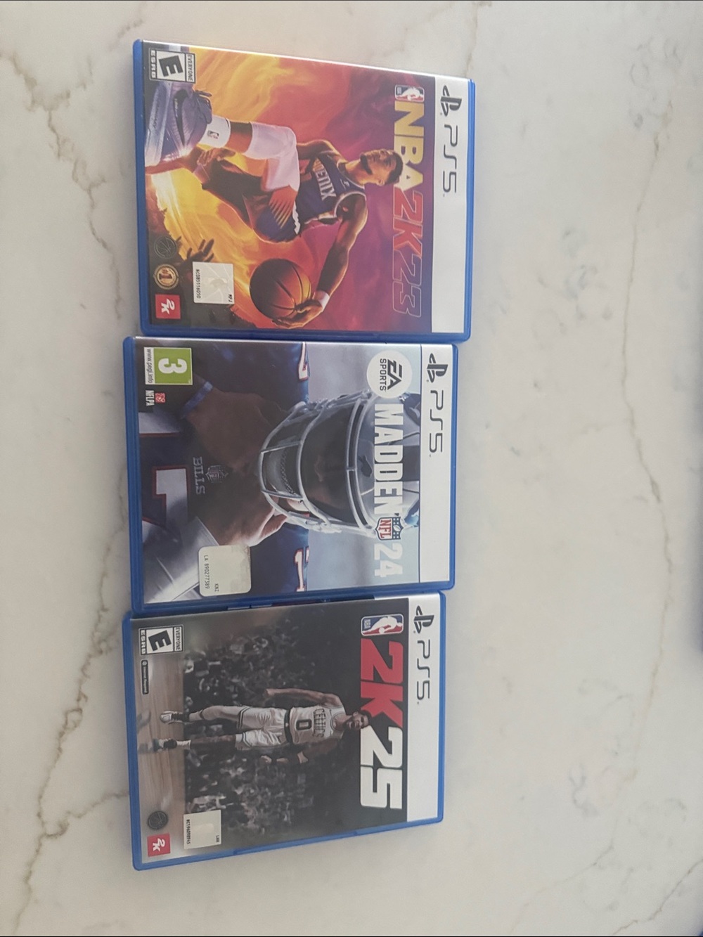 PlayStation 5 Blue Game Case Bundle (NBA 2K23, Madden NFL 24, NBA 2K25)